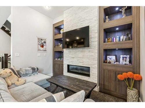 2022 37 Street Sw, Calgary, AB - Indoor Photo Showing Living Room With Fireplace