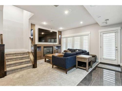 2022 37 Street Sw, Calgary, AB - Indoor Photo Showing Living Room With Fireplace