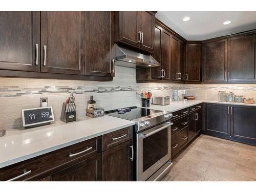 1881 Reunion Terrace Nw, Airdrie, AB - Indoor Photo Showing Kitchen With Upgraded Kitchen