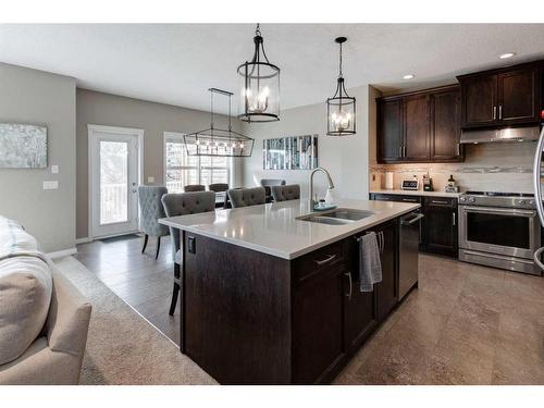 1881 Reunion Terrace Nw, Airdrie, AB - Indoor Photo Showing Kitchen With Double Sink