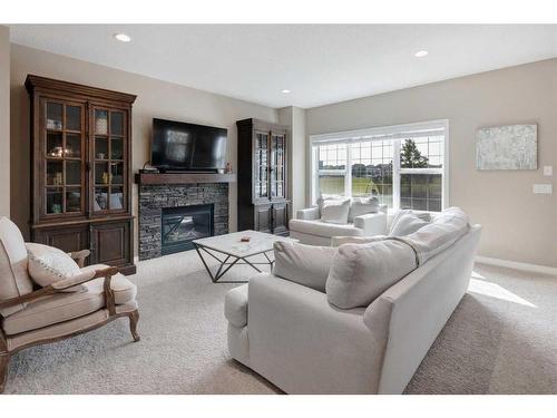 1881 Reunion Terrace Nw, Airdrie, AB - Indoor Photo Showing Living Room With Fireplace