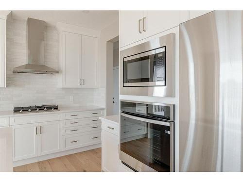 108 Cimarron Estates Drive, Okotoks, AB - Indoor Photo Showing Kitchen With Upgraded Kitchen