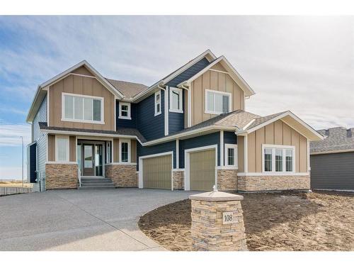 108 Cimarron Estates Drive, Okotoks, AB - Outdoor With Facade