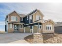 108 Cimarron Estates Drive, Okotoks, AB  - Outdoor With Facade 