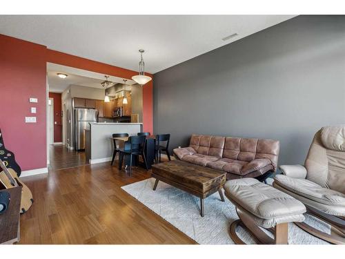 18-169 Rockyledge View Nw, Calgary, AB - Indoor Photo Showing Living Room