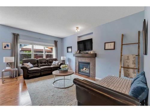 400 Kincora Glen Rise Nw, Calgary, AB - Indoor Photo Showing Living Room With Fireplace