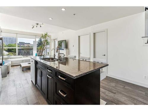 403-1730 5A Street Sw, Calgary, AB - Indoor Photo Showing Kitchen With Double Sink