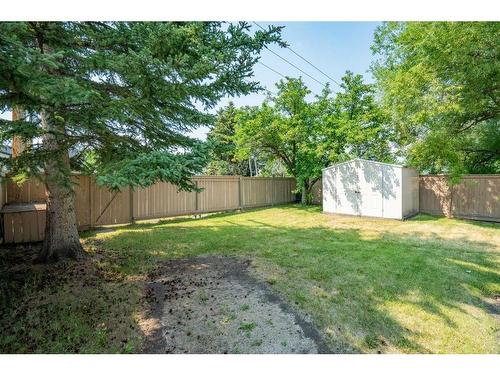 124 Woodborough Road Sw, Calgary, AB - Outdoor With Backyard