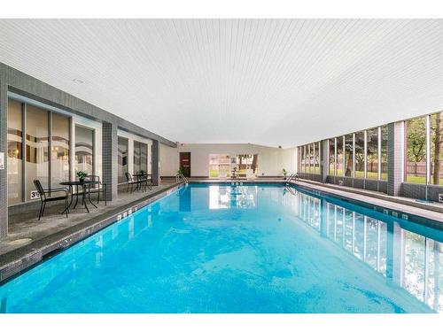 904-4944 Dalton Drive Nw, Calgary, AB - Indoor Photo Showing Other Room With In Ground Pool