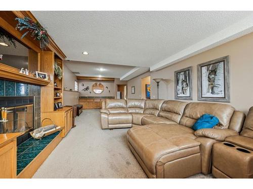 2851 Catalina Boulevard Ne, Calgary, AB - Indoor Photo Showing Living Room With Fireplace