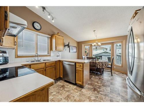 2851 Catalina Boulevard Ne, Calgary, AB - Indoor Photo Showing Kitchen With Double Sink