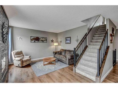 243 Copperpond Bay Se, Calgary, AB - Indoor Photo Showing Living Room