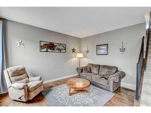 243 Copperpond Bay Se, Calgary, AB - Indoor Photo Showing Living Room