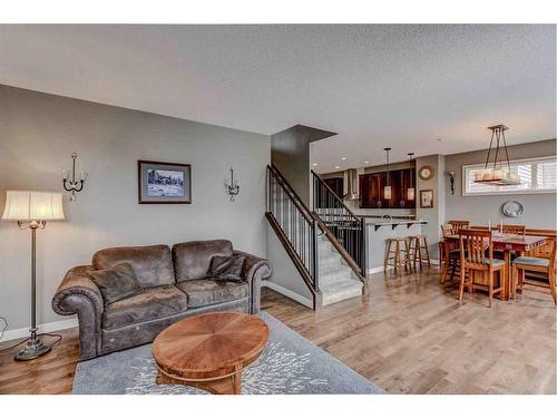 243 Copperpond Bay Se, Calgary, AB - Indoor Photo Showing Living Room