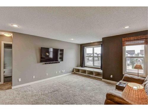 243 Copperpond Bay Se, Calgary, AB - Indoor Photo Showing Living Room