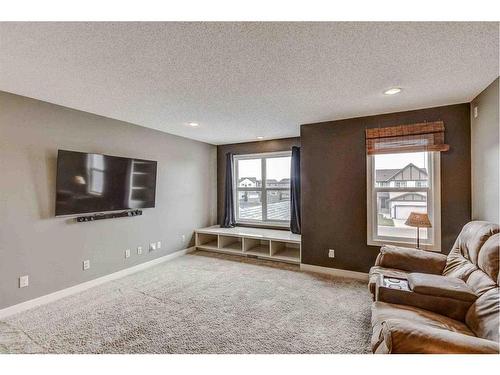 243 Copperpond Bay Se, Calgary, AB - Indoor Photo Showing Living Room