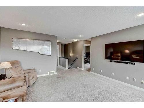 243 Copperpond Bay Se, Calgary, AB - Indoor Photo Showing Living Room