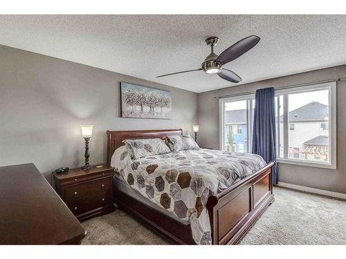 243 Copperpond Bay Se, Calgary, AB - Indoor Photo Showing Bedroom