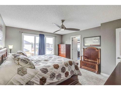 243 Copperpond Bay Se, Calgary, AB - Indoor Photo Showing Bedroom