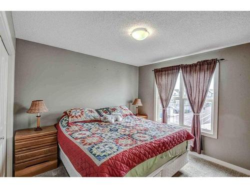 243 Copperpond Bay Se, Calgary, AB - Indoor Photo Showing Bedroom