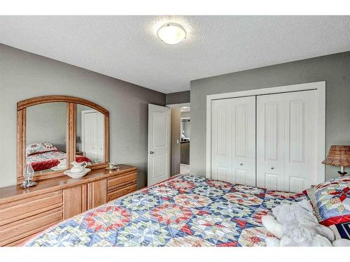 243 Copperpond Bay Se, Calgary, AB - Indoor Photo Showing Bedroom