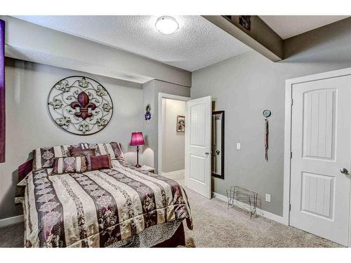 243 Copperpond Bay Se, Calgary, AB - Indoor Photo Showing Bedroom