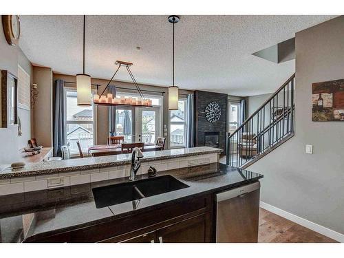 243 Copperpond Bay Se, Calgary, AB - Indoor With Fireplace