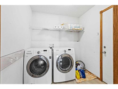 210 Coral Springs Place Ne, Calgary, AB - Indoor Photo Showing Laundry Room