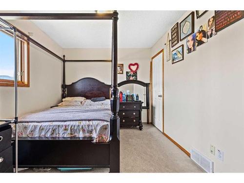 210 Coral Springs Place Ne, Calgary, AB - Indoor Photo Showing Bedroom