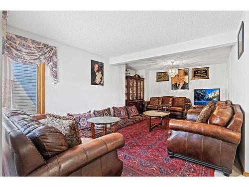 210 Coral Springs Place Ne, Calgary, AB - Indoor Photo Showing Living Room