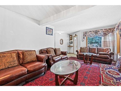 210 Coral Springs Place Ne, Calgary, AB - Indoor Photo Showing Living Room