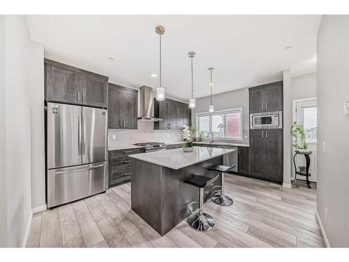 213 Livingston View Nw, Calgary, AB - Indoor Photo Showing Kitchen With Stainless Steel Kitchen With Upgraded Kitchen