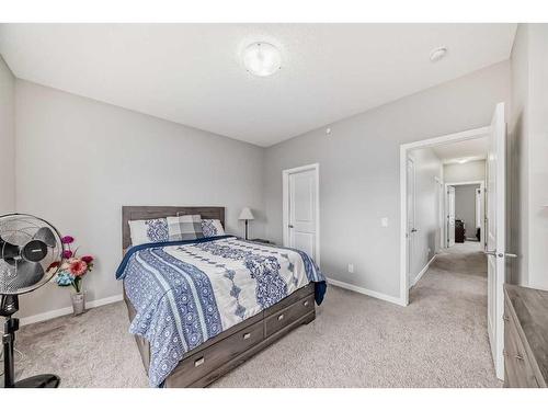 213 Livingston View Nw, Calgary, AB - Indoor Photo Showing Bedroom