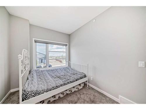 213 Livingston View Nw, Calgary, AB - Indoor Photo Showing Bedroom