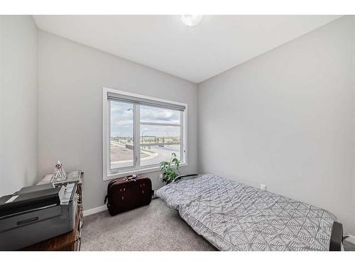 213 Livingston View Nw, Calgary, AB - Indoor Photo Showing Bedroom