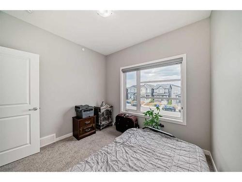 213 Livingston View Nw, Calgary, AB - Indoor Photo Showing Bedroom