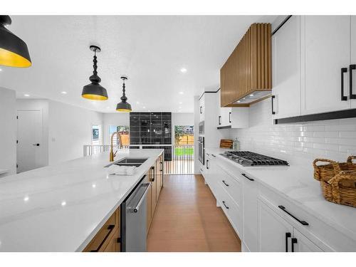 9828 19 Street Sw, Calgary, AB - Indoor Photo Showing Kitchen With Double Sink With Upgraded Kitchen