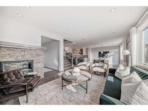 22 Timberline Place Sw, Calgary, AB - Indoor Photo Showing Living Room With Fireplace