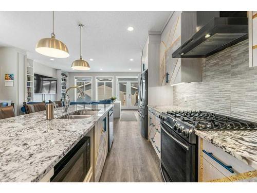 8 Seton Terrace Se, Calgary, AB - Indoor Photo Showing Kitchen With Stainless Steel Kitchen With Double Sink With Upgraded Kitchen