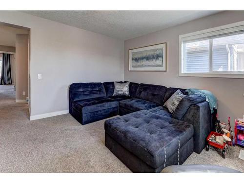 88 Cooperstown Place Sw, Airdrie, AB - Indoor Photo Showing Living Room