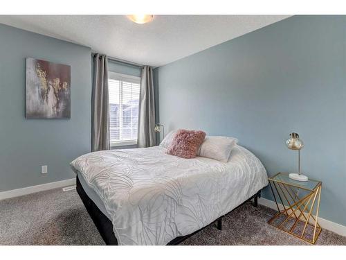 88 Cooperstown Place Sw, Airdrie, AB - Indoor Photo Showing Bedroom