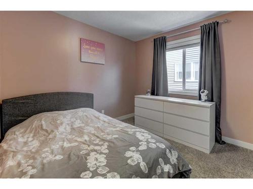 88 Cooperstown Place Sw, Airdrie, AB - Indoor Photo Showing Bedroom