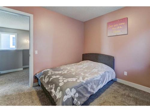 88 Cooperstown Place Sw, Airdrie, AB - Indoor Photo Showing Bedroom