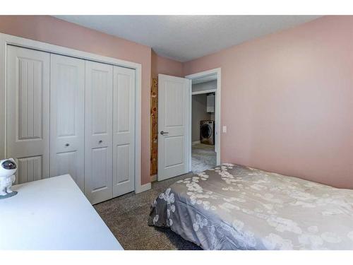 88 Cooperstown Place Sw, Airdrie, AB - Indoor Photo Showing Bedroom