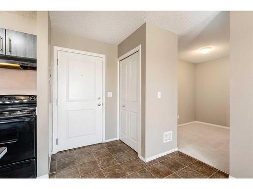 404-15 Saddlestone Way Ne, Calgary, AB - Indoor Photo Showing Other Room