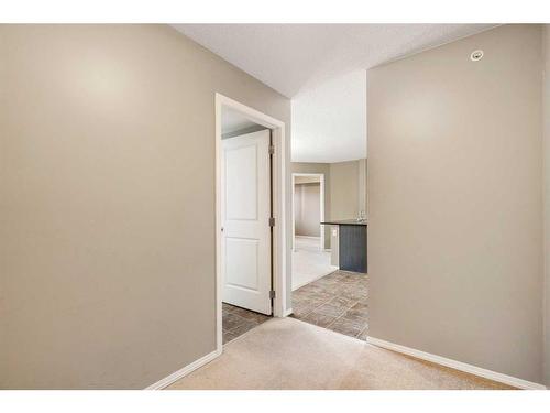 404-15 Saddlestone Way Ne, Calgary, AB - Indoor Photo Showing Other Room