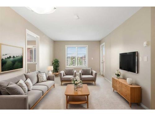 404-15 Saddlestone Way Ne, Calgary, AB - Indoor Photo Showing Living Room