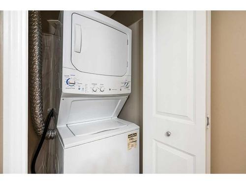 404-15 Saddlestone Way Ne, Calgary, AB - Indoor Photo Showing Laundry Room