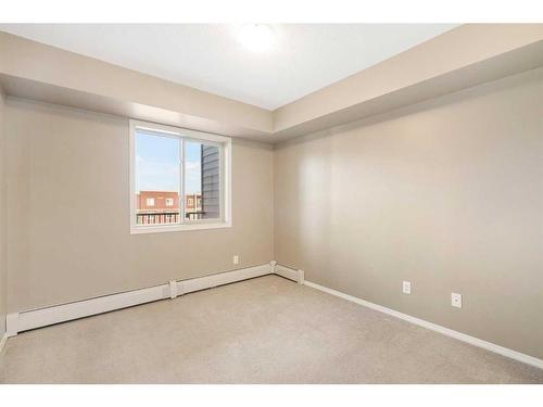 404-15 Saddlestone Way Ne, Calgary, AB - Indoor Photo Showing Other Room