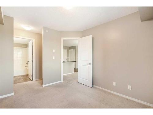 404-15 Saddlestone Way Ne, Calgary, AB - Indoor Photo Showing Other Room